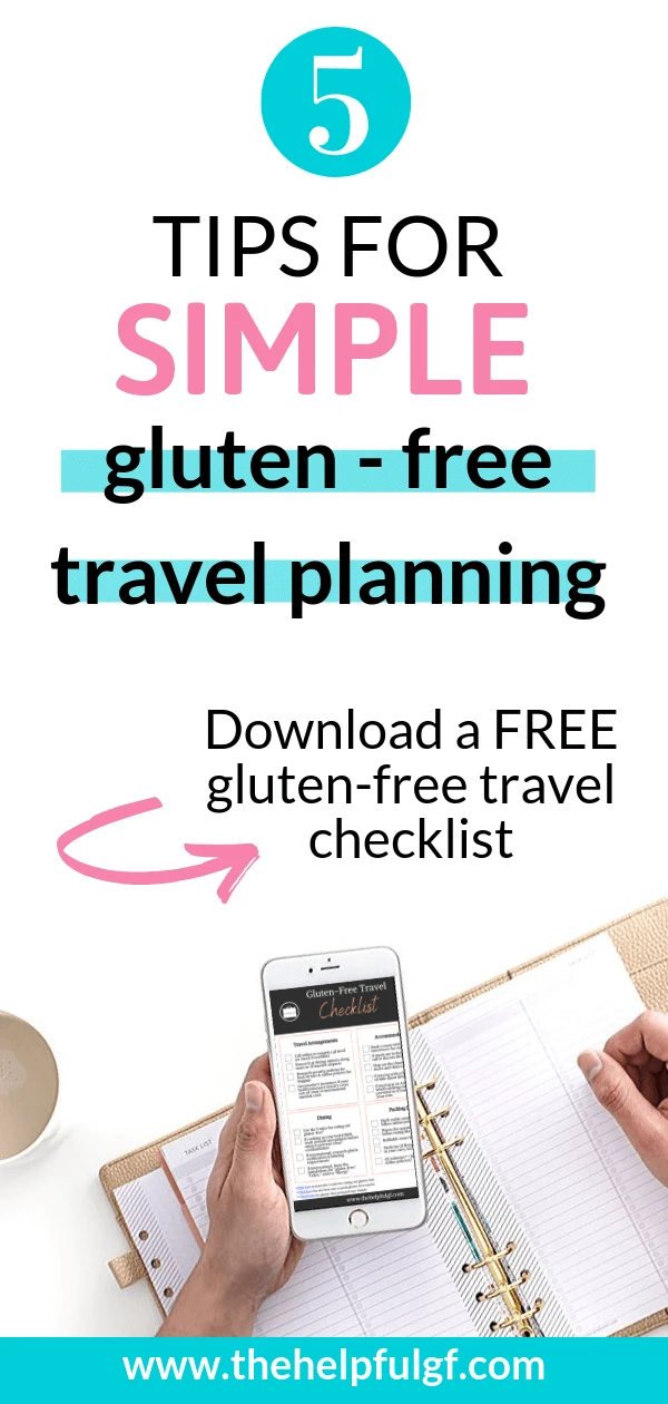 pin image with phone containing free printable travel checklist and writing in planner