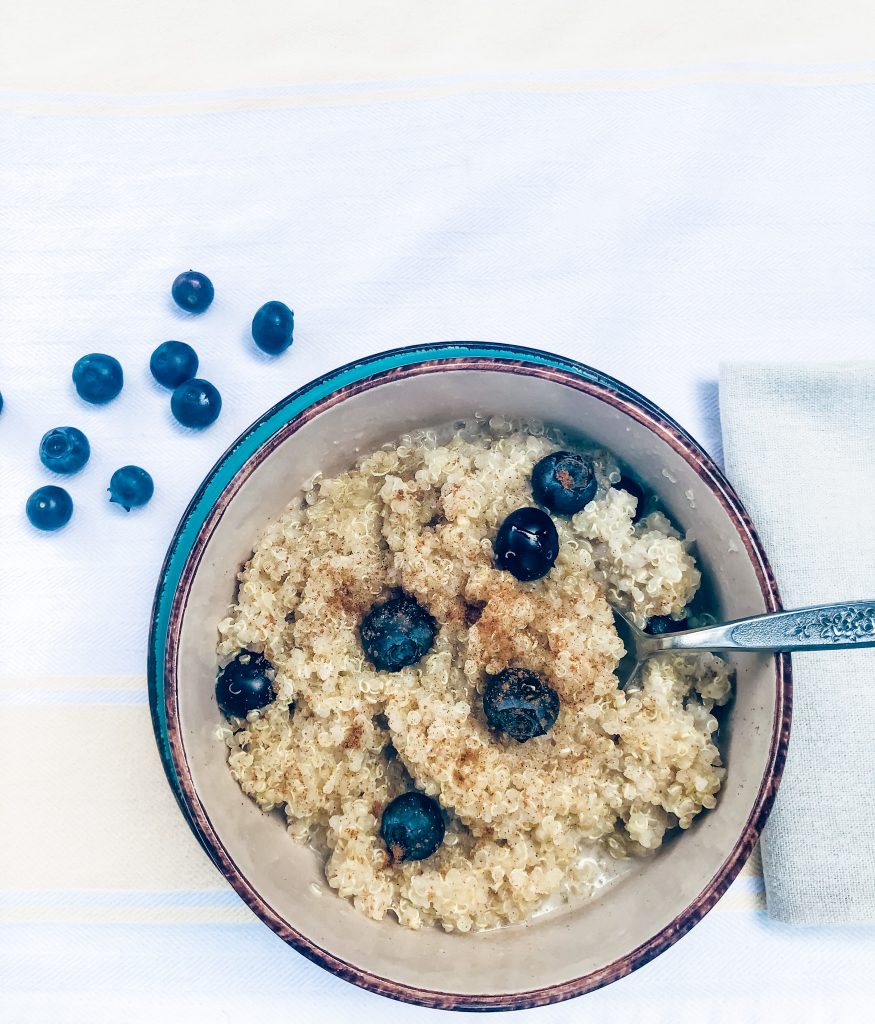 creamy quinoa topped with blueberries