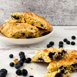 lemon blueberry scones cut and on plate side view