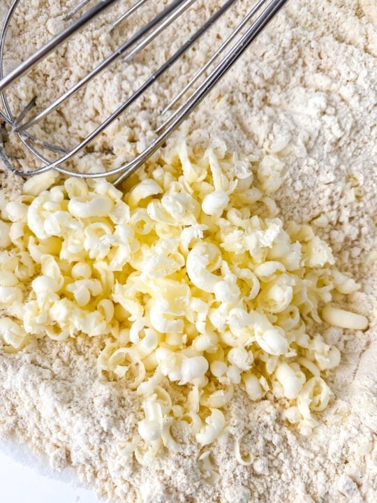 mixing grated butter into scone mixture