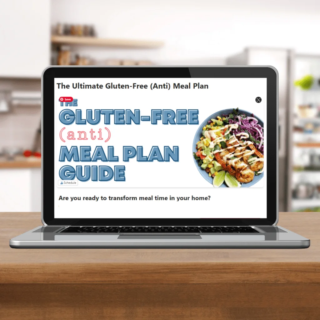 laptop on kitchen counter with (anti) meal plan mock up