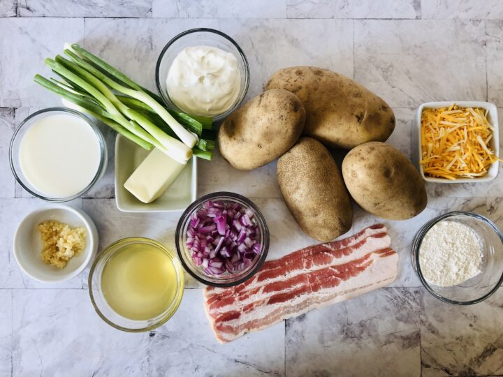 ingredients for gluten free loaded baked potato soup potatoes, cheese, gf flour, bacon, onion, sour cream, milk, butter, garlic