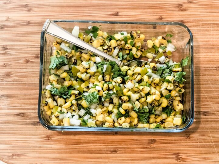 mixing together easy corn salsa