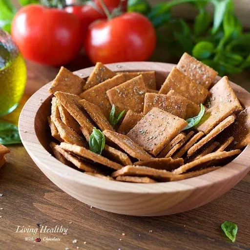 wooden bowl with homemade gluten free cassava crackers