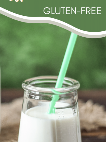 gluten-free almond milk in glass with straw