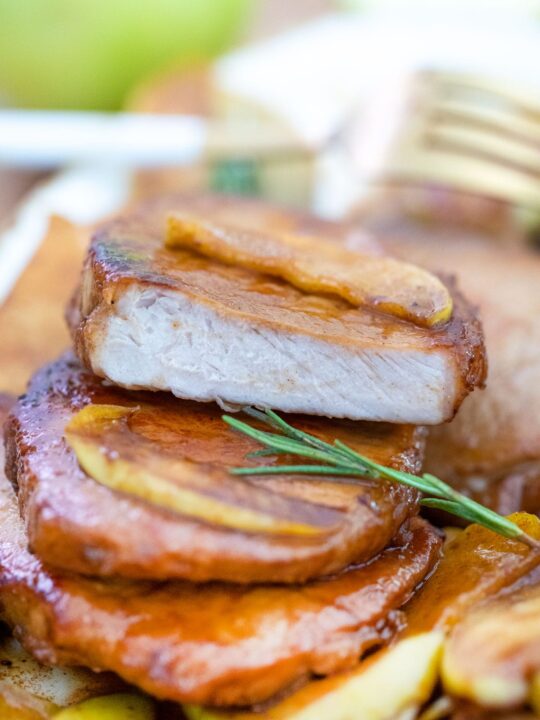 sliced pork chop topped with cinnamon apples