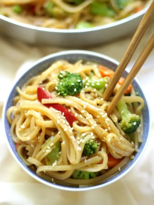 gluten free veggie lo mein in bowl with chopsticks