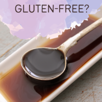 rectangle dish of worcestershire sauce with spoon and text is worcestershire sauce gluten free