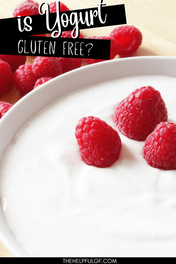White bowl of white yogurt topped with 3 raspberries, with text overlay that says 'Is yogurt gluten free'
