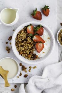 gluten free air fryer granola on top of dairy free yogurt