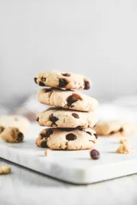 stack of almond flour chocolate chip cookies on cutting board