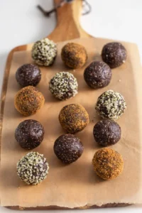 vegan no bake chocolate superfood balls on cutting board