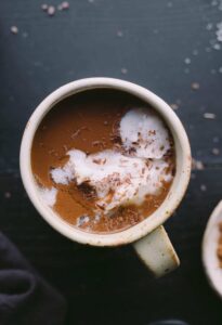 maca superfood hot chocolate in white mug