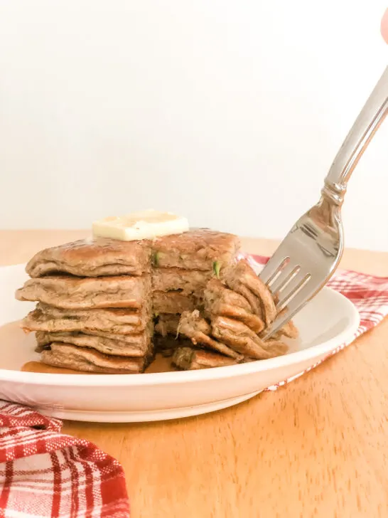 slices of zucchini pancakes on fork