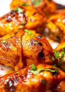 instant pot chicken drumsticks topped with parsley