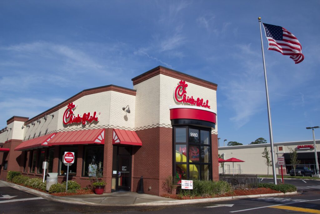 Exterior of Chick-Fil-A restaurant with american flag