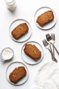 cassava flour banana bread on white plates with forks