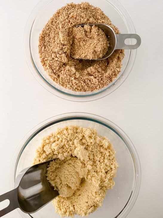 two glass bowls, one with homemade almond meal and the other with homemade almond flour