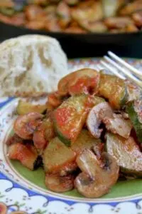 italian zucchini and mushrooms on plate with fork