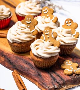 gluten free low carb gingerbread cupcakes topped with mini gingerbread man cookies