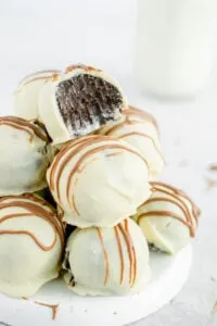 gluten free oreo snowballs on white plate