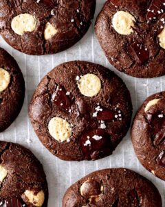 gluten free vegan triple chocolate cookies on parchment