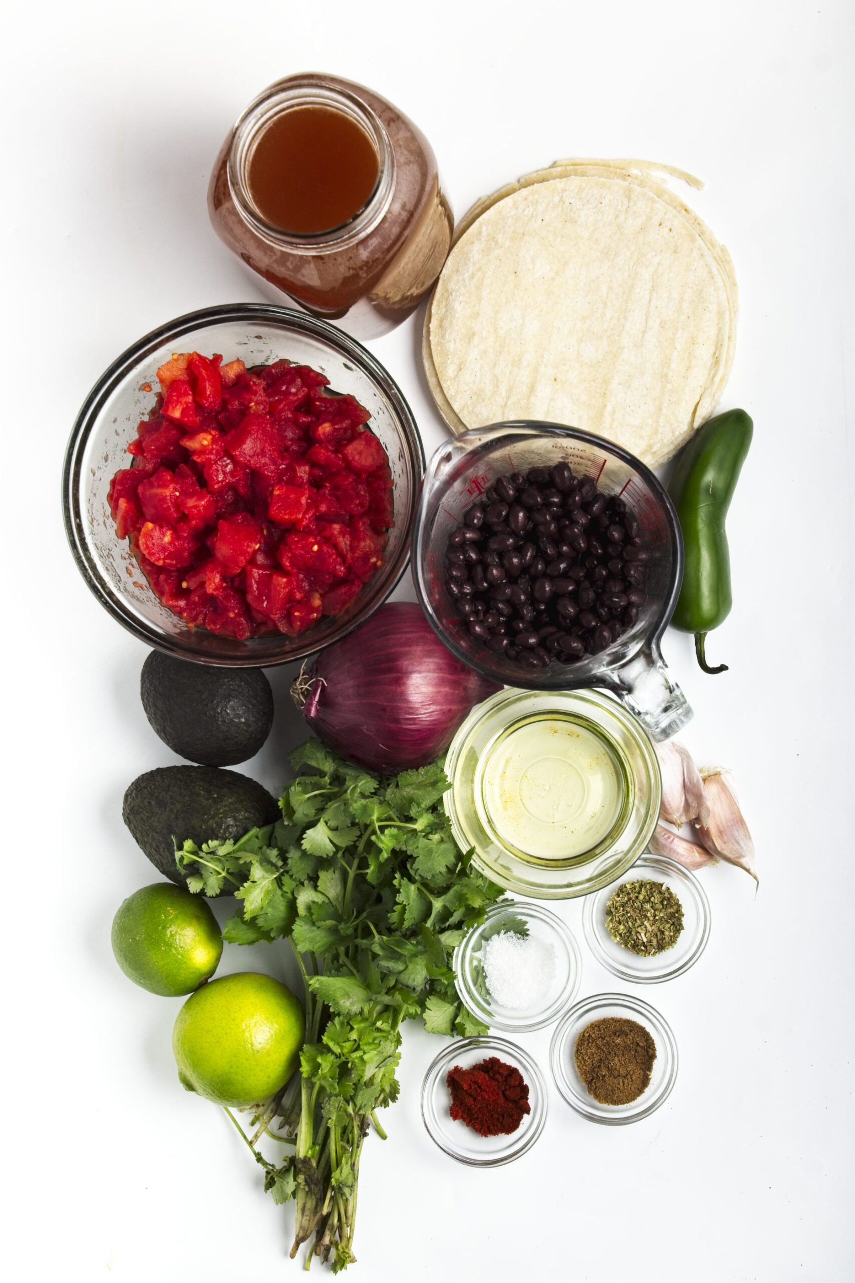 All of the ingredients for vegetarian tortilla soup sitting together
