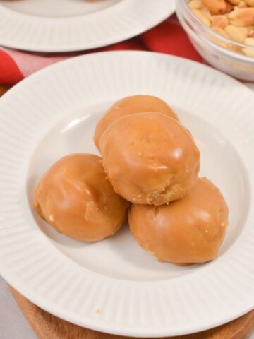gluten free chocolate peanut butter protein donut holes on white plate