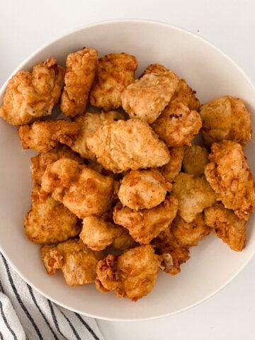 thumbnail image of chick-fil-a copycat gluten free chicken nuggets on white plate