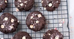 Gluten Free Chocolate Peppermint Cookies with white chocolate chips and peppermint candy on baking tray