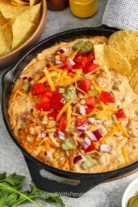 cheeseburger dip in skillet with chips