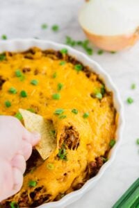 chili cheese dip with tortilla chip